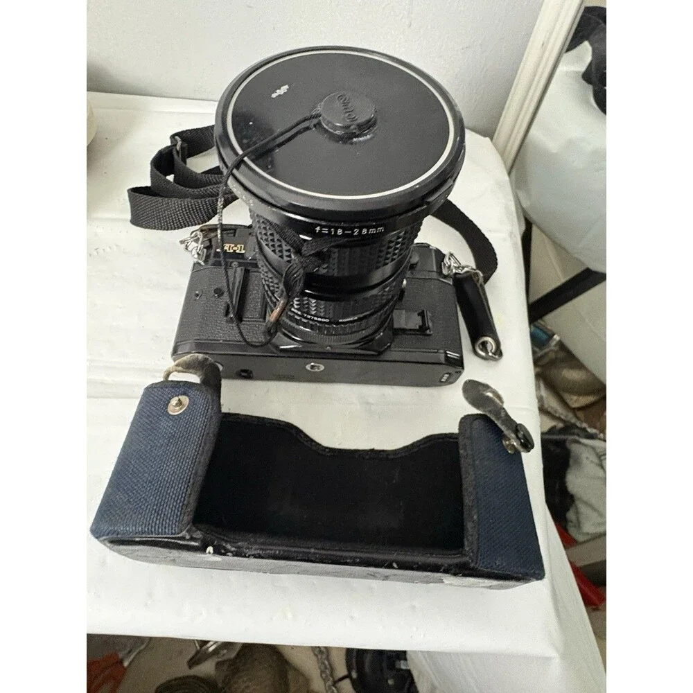 Canon A-1 35mm Film Camera with toyo optics 28mm 1:3.5 Lens and F=28-80  Tested